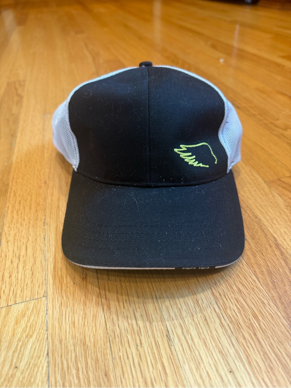 Dekalb Black and White Mesh Trucker Hat with Lime Wing Logo
